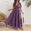 Elegantes lila geblümtes Maxikleid mit V-Ausschnitt, Puffärmeln und elastischer Taille - 1XL / Kleider
