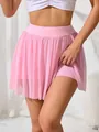 Dettaglio della gonna pantalone sportiva rosa in mesh a vita alta con fodera. - Taglia S / Pantaloni e gonne / Rosa chiaro