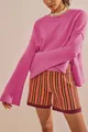 Elegant pink crewneck sweater with fashionable bell sleeves in a cozy knit for women - Rose Red