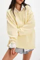 Oversized pale yellow crewneck knit sweater featuring a comfortable drop shoulder design - Yellow
