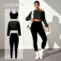 Ensemble de yoga noir 3 pièces avec brassière, legging et haut à manches longues - Noir