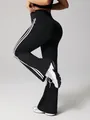 High waist black flared yoga pants with white side stripes for gym and fitness wear. - S / Bottoms / Black