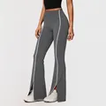 High-waisted grey flare yoga pants with white piping and split hem for women's sports - S / Bottoms / Gray