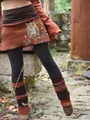 Detailed view of bohemian color-blocked legging skirt featuring an artistic owl print - S / Set / Orange Print