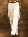 Stylish white high-waisted fringe flare pants for women in an outdoor rustic setting - S / Bottoms / White