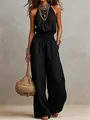 Elegant black sleeveless linen backless jumpsuit for a chic summer vacation look - S / Jumpsuits / Black