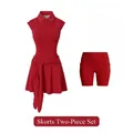 Vibrant red two-piece tennis dress set with sleeveless polo and matching active shorts. - XS / Dresses / Cinnabar Red
