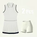 Robe de tennis polo sans manches blanche et short assorti ensemble 2 pièces bordure noire - XS / Ensemble / Blanc