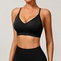 Premium black seamless knitted yoga sports bra featuring elegant cross back strap design - XS / Tops / Black