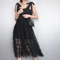 Elegant black sleeveless camisole dress with tiered mesh patchwork and ribbon tie straps - S / Dresses / Black