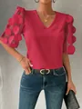 Red V-neck blouse featuring 3D mesh puff sleeves with textured circular patterns. - L / Tops / Rose Red