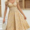Vintage yellow floral French dress with puff sleeves and V-neck line detail. - S / Dress (23059) / Turmeric