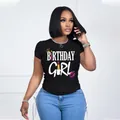 Detailed view of women's black T-shirt with Birthday Girl print and artistic graphics - S / Tops / Black