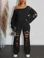 Close-up detail of black distressed two-piece set featuring ripped off-shoulder top and pants - S / Top And Bottom / Black