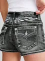 Detalle de pantalones cortos vaqueros negros con intrincado bordado floral en cintura - S / Bottoms / Negro