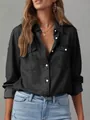Detail view of the black denim long-sleeved shirt with single-breasted buttons. - S / Tops / Black