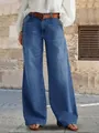 Détail d'un jean rétro à jambes larges avec des poches décoratives à boutons. - S / Bas / Bleu Foncé (26023#)