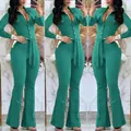 Elegant green long-sleeve collared jumpsuit with waist tie and flared leg detail - S / Set / Green