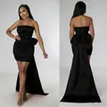 Elegant black tube bodycon mini dress featuring an oversized bow and long back train - S / Dresses / Black