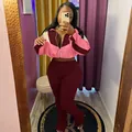 Women's two-piece color-block zip-up tracksuit set featuring burgundy flare leggings - Pink