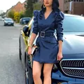 Close-up of stylish navy blue faux leather V-neck dress with puff sleeves and belt - S / Dresses / Navy Blue