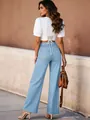 Jeans retrò azzurri a vita alta e gamba larga con una vestibilità ampia e rilassata - Taglia S / Pantaloni e gonne / Celeste