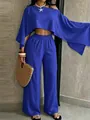 Detalle de conjunto azul de dos piezas para vacaciones con top y pantalón ancho - Azul