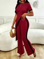 Two-piece burgundy set with contrast black stripes and diagonal waist-revealing top - Burgundy