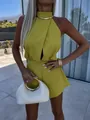 Close-up of lime green halter neck sleeveless romper with front cut-out detail - S / Top And Bottom / Neon Yellow