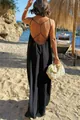 Vista posterior de un vestido largo de verano negro con espalda descubierta en la playa - S / Vestidos / Negro