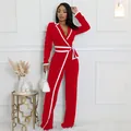 Elegante mono rojo de manga larga con ribete blanco en contraste y cinturón ajustable - S / Conjuntos / Rojo