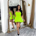 Vibrant neon green sleeveless bodycon mini dress with a wavy ruffled hemline for summer. - Fluorescent Green