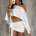 Elegant white one-shoulder top and tie-wrap mini skirt set for a chic vacation look - S / Top And Bottom / White