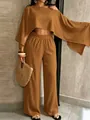 Completo due pezzi ocra con top asimmetrico e pantaloni a gamba larga per look da vacanza. - Taglia L / Top E Pantaloni / Marrone