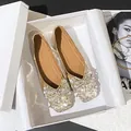 Elegant gold wedding flats with rhinestone bow and pearl accents in a gift box. - 34 / Gold