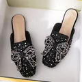 Elegant black flat mules for women with sparkling rhinestone bow, sequins, and pearls - 34 / Black