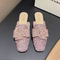 Pink and purple rhinestone flat mule slippers with pearl embellishments and a large buckle. - 38 / Pink