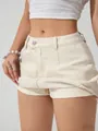Gros plan détaillé d'une jupe-short en jean beige vintage pour femme avec doublure intérieure - XS / Bas / Blanc Cassé