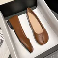 Elegant brown leather Tabi split-toe ballet flats for women with minimalist slip-on design - 34 / Coffee