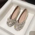 Elegant champagne gold flat shoes decorated with shimmering rhinestones and a bow detail - 38 / Gold