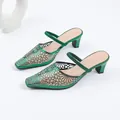 Elegant green glitter mule sandals with floral rhinestone mesh design and mid-heel - 35 / Green