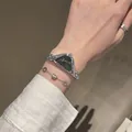 Elegante reloj de cuarzo GUOU para mujer en plata con forma de media luna y esfera negra - Plata Negro