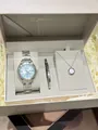 Detailed view of women's silver quartz watch with matching bangle and necklace set - Watch Only / Silver & Blue