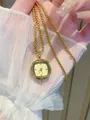 Elegante Vintage-Halskette mit quadratischer Gold-Taschenuhr an feiner Kette. - Quadratische Taschenuhr Anhänger Halskette / Gold (88449)