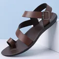 Stylish brown men's beach sandals with cross-strap and toe loop design - 39 / Brown