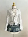Detail view of a striped slim-fit V-neck shirt with a zipper and flared cuffs. - White