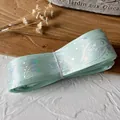 Mint green holographic ribbon with iridescent butterfly and star patterns for DIY crafts. - Mint Green Silver Stamping - Butterfly Pattern / Length 9m Width 2.5cm