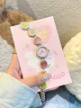 Primer plano de un lindo reloj de pulsera de dibujos animados para niñas en rosa - Caramelos de Arcoíris (2379) / Frijoles de gelatina arcoíris