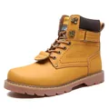 Macro detail view of a yellow leather work boot showing side stitching and texture - 38 / Flats / Yellow