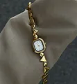 Macro view of vintage gold bracelet watch with irregular geometric link design - Streaming White Gold